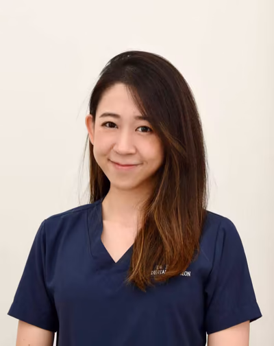 Dr. Jill Lee Zi Thung, Resident Dental Surgeon at Lau Dental Clinic, specializing in cosmetic crowns and bridges.