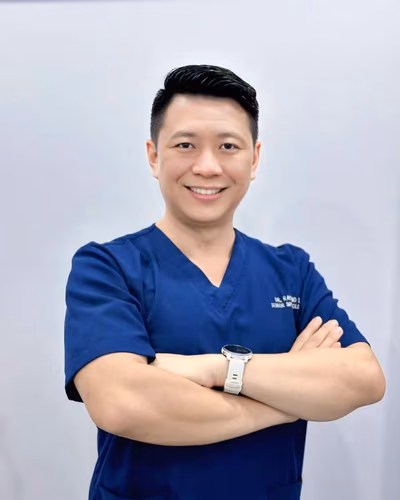 Implant dentist Dr. Raymond Su at Lau Dental Clinic in Sri Petaling Kuala Lumpur