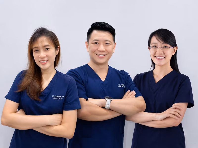Dental specialists performing advanced treatments at Lau Dental Clinic